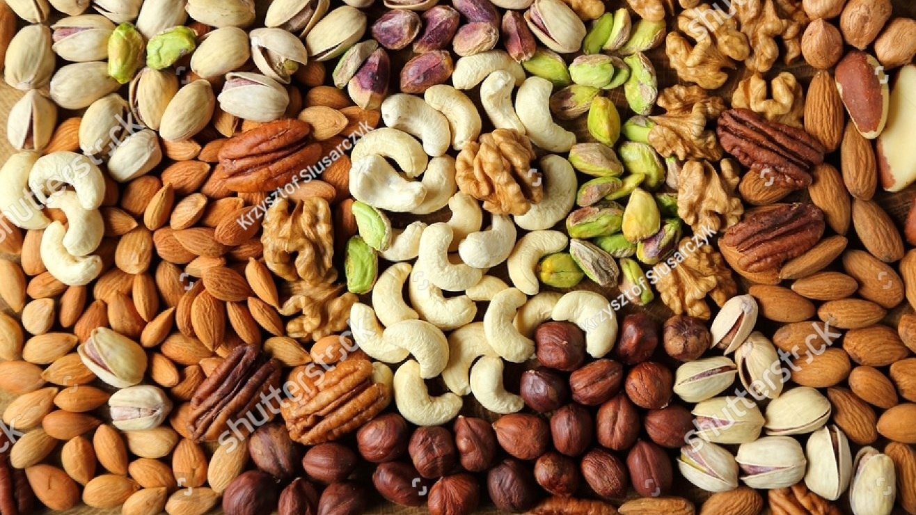 stock-photo-natural-background-made-from-different-kinds-of-nuts-407297545.jpg